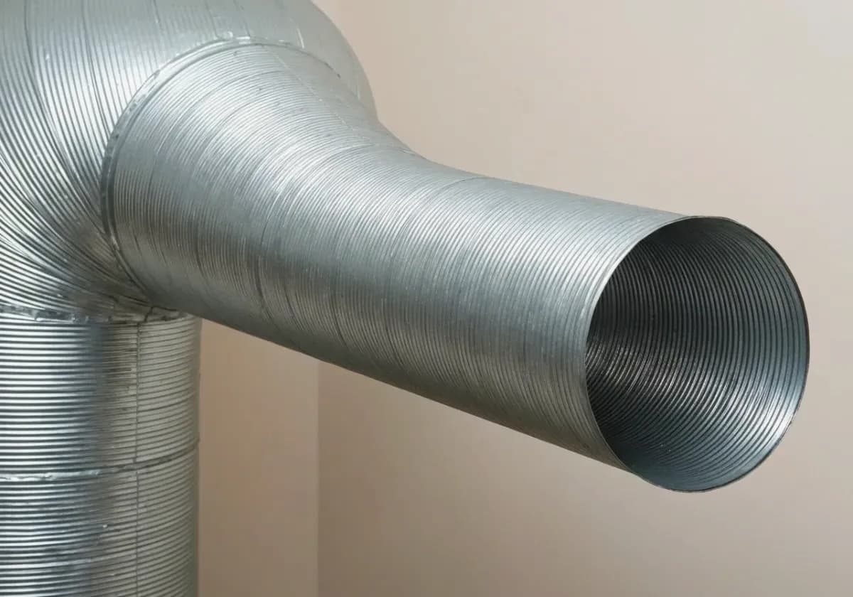 After — dryer vent cleaning: A lint-choked dryer line cleared end to end for safe, fast drying.